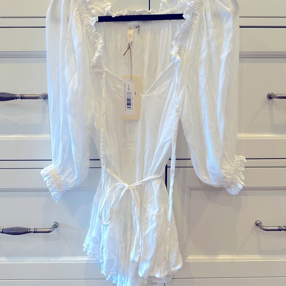 Elan cover up in white. Brand new never worn.
